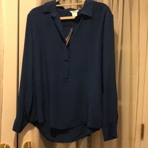 Navy blue silk half button long sleeve blouse.